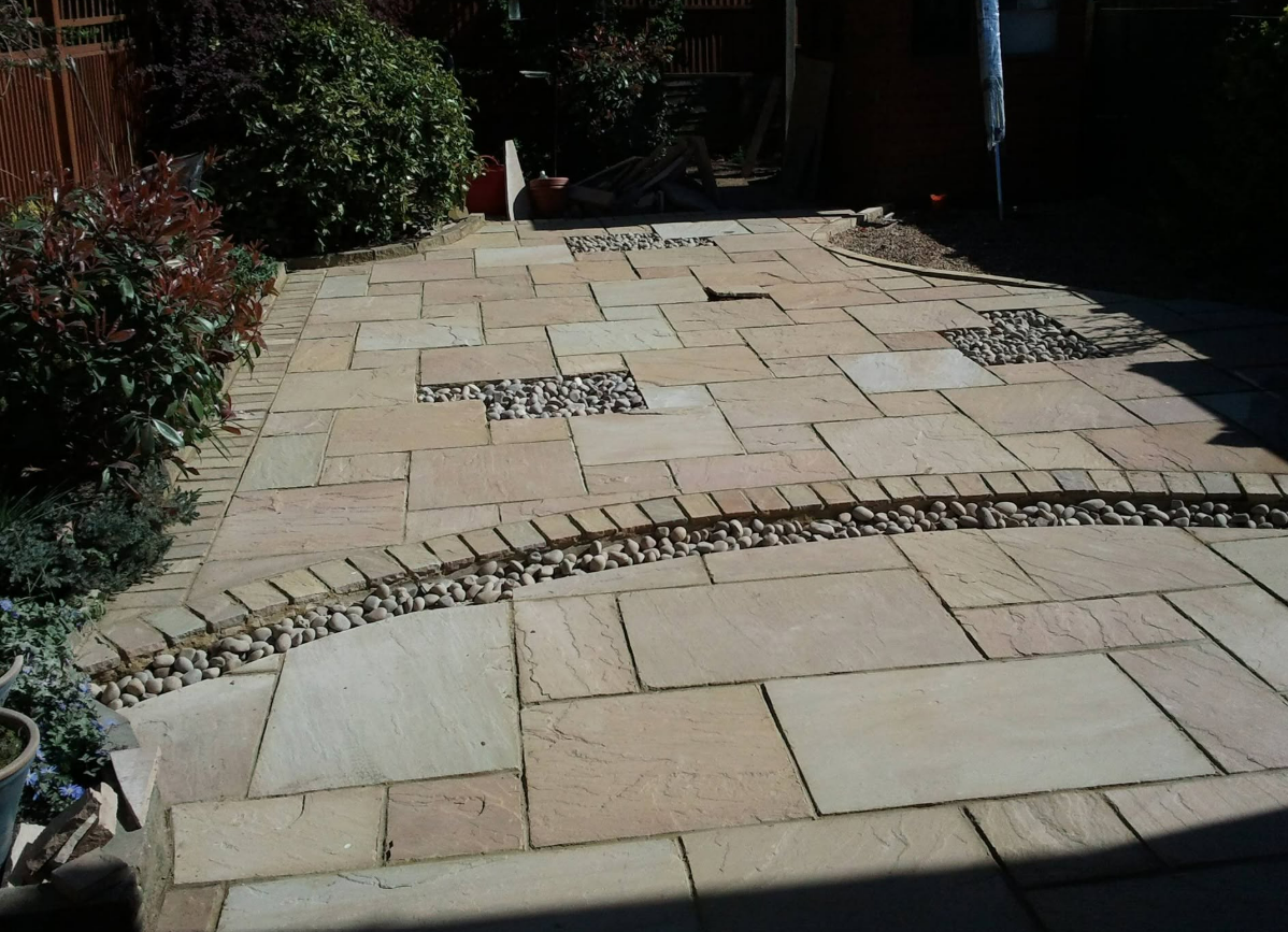 Sandstone Patio with Pebble Features